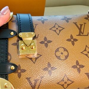 L.V. Reverse Monogram Side Trunk PM Crossbody Bag